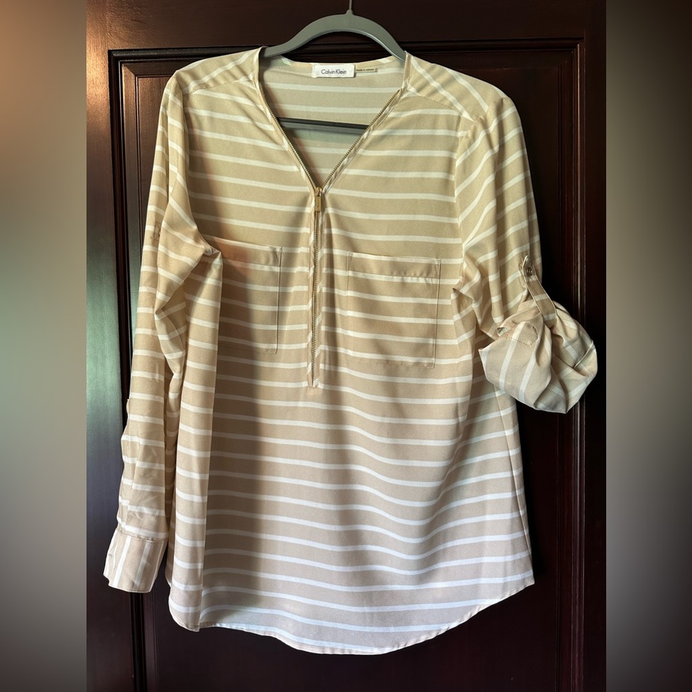 Longer style sporty blouse